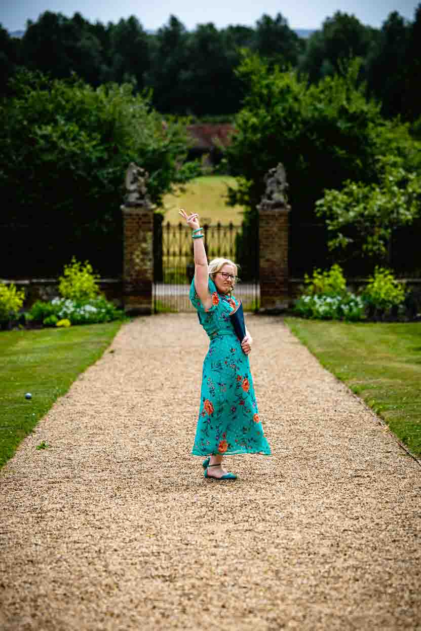 Deb Reed Celebrant Essex Colchester posing with arms out smiling.